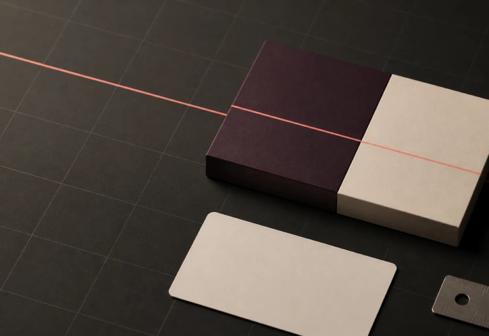 A dark editorial grid with a single measured coral line running across plum and cream blocks
